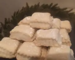 Step <p>Dejar reposar y rebozar en azúcar.</p> illustration